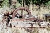 Iron wheel supported on wooden beams